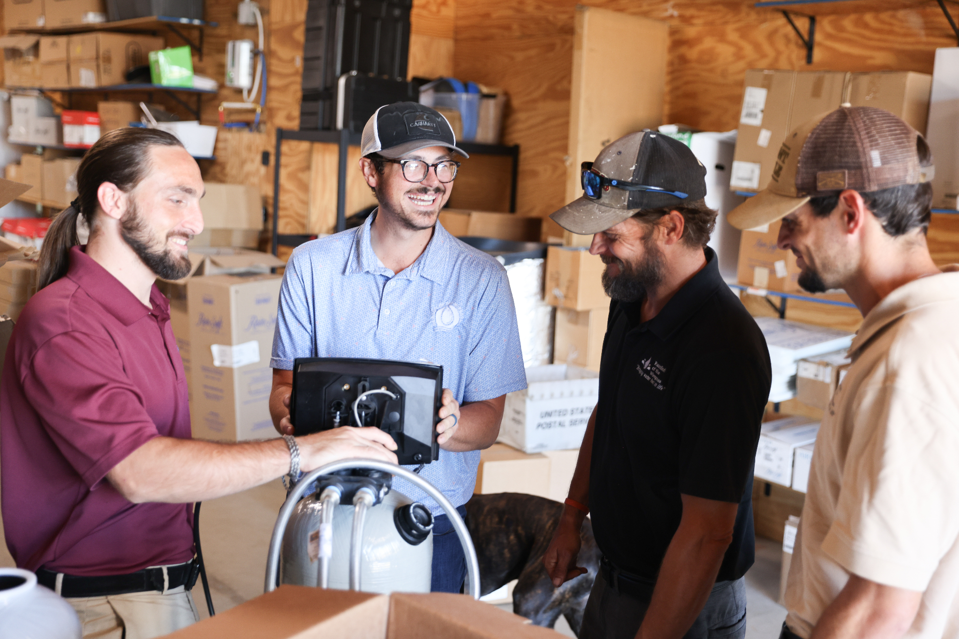 RainSoft of the Wiregrass team collaborating in the warehouse